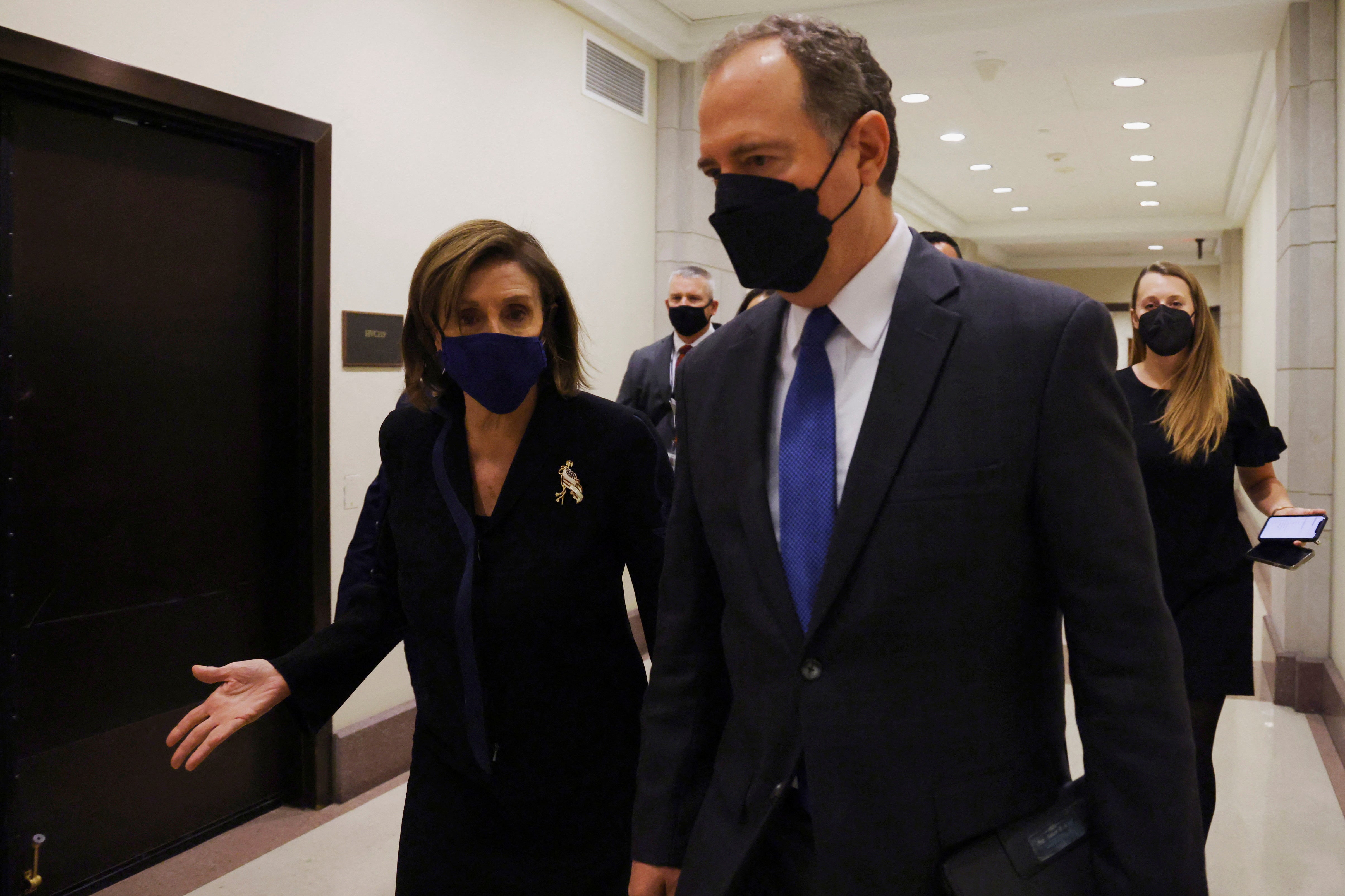 US House Speaker Nancy Pelosi (D-CA) and Representative Adam Schiff (D-CA) arrive for a news conference for their Protecting Our Democracy Act to attempt to create checks and balances on presidential power, on Capitol Hill in Washington, 9 December 2021.