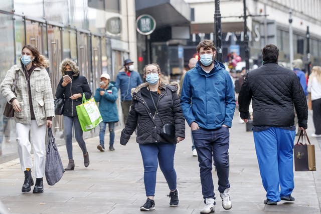 Masks are now mandatory in most public indoor settings in England (Danny Lawson/PA)