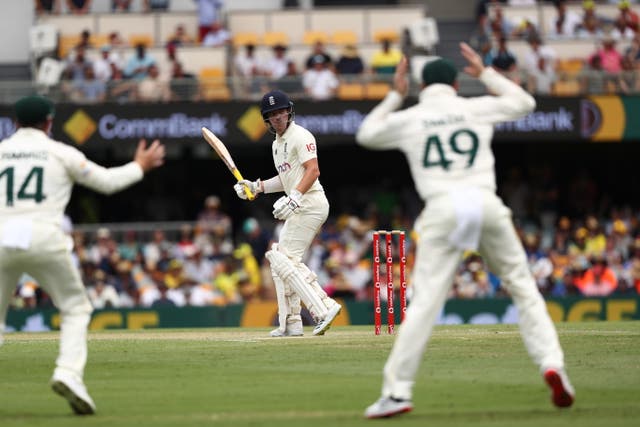 Rory Burns came desperately close to a second duck of the match as England began the mammoth task of batting their way back into the first Ashes Test in Brisbane (Jason O’Brien/PA)