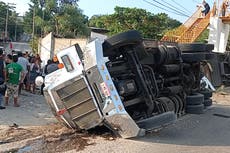 At least 54 dead as freight truck packed with migrants crashes in Mexico