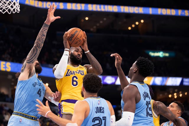 Los Angeles Lakers forward LeBron James is crowded out (Nikki Boertman/AP)