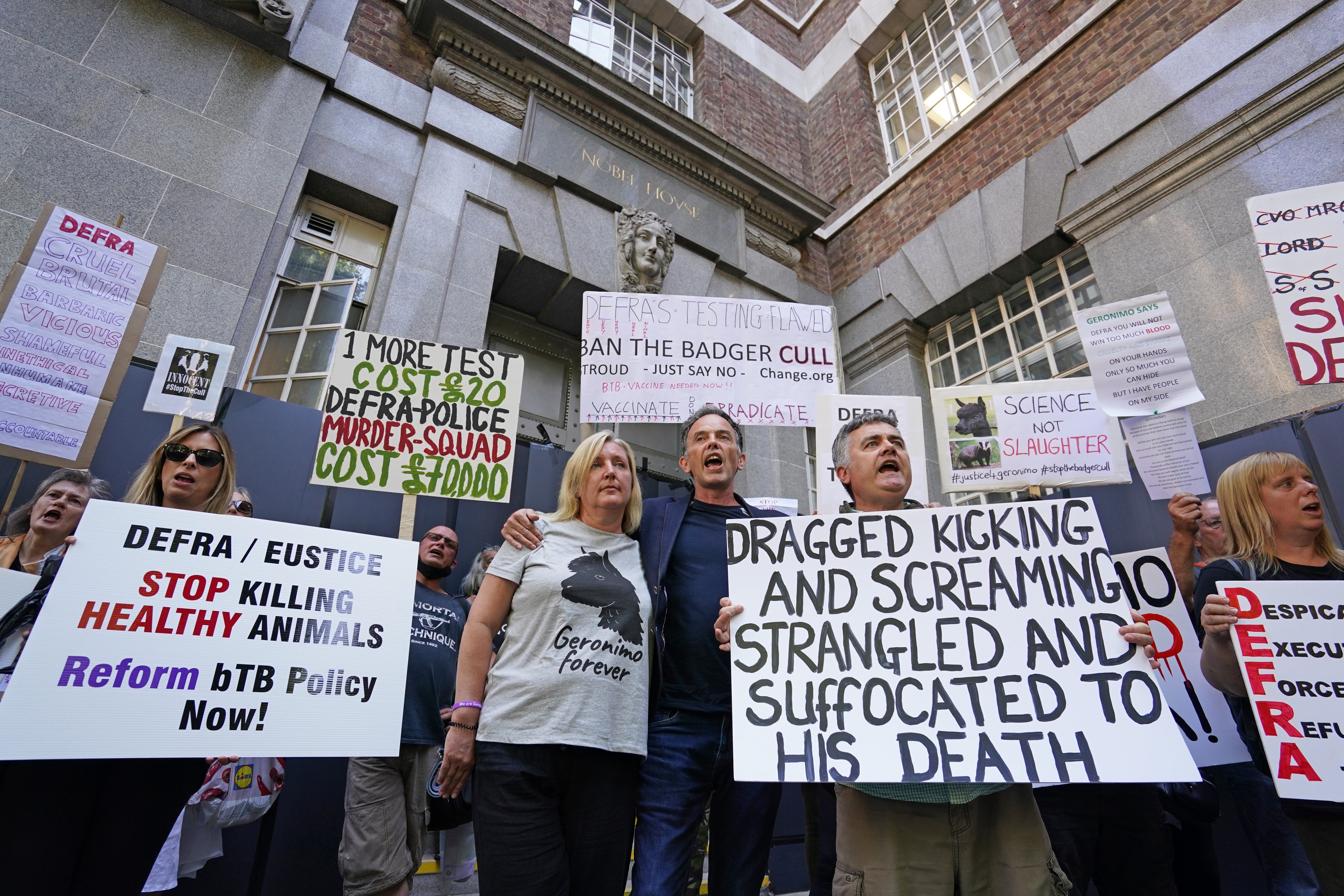 Following Geronimo’s culling, owner Helen Macdonald joined protesters outside Defra HQ in London (Dominic Lipinski/PA)
