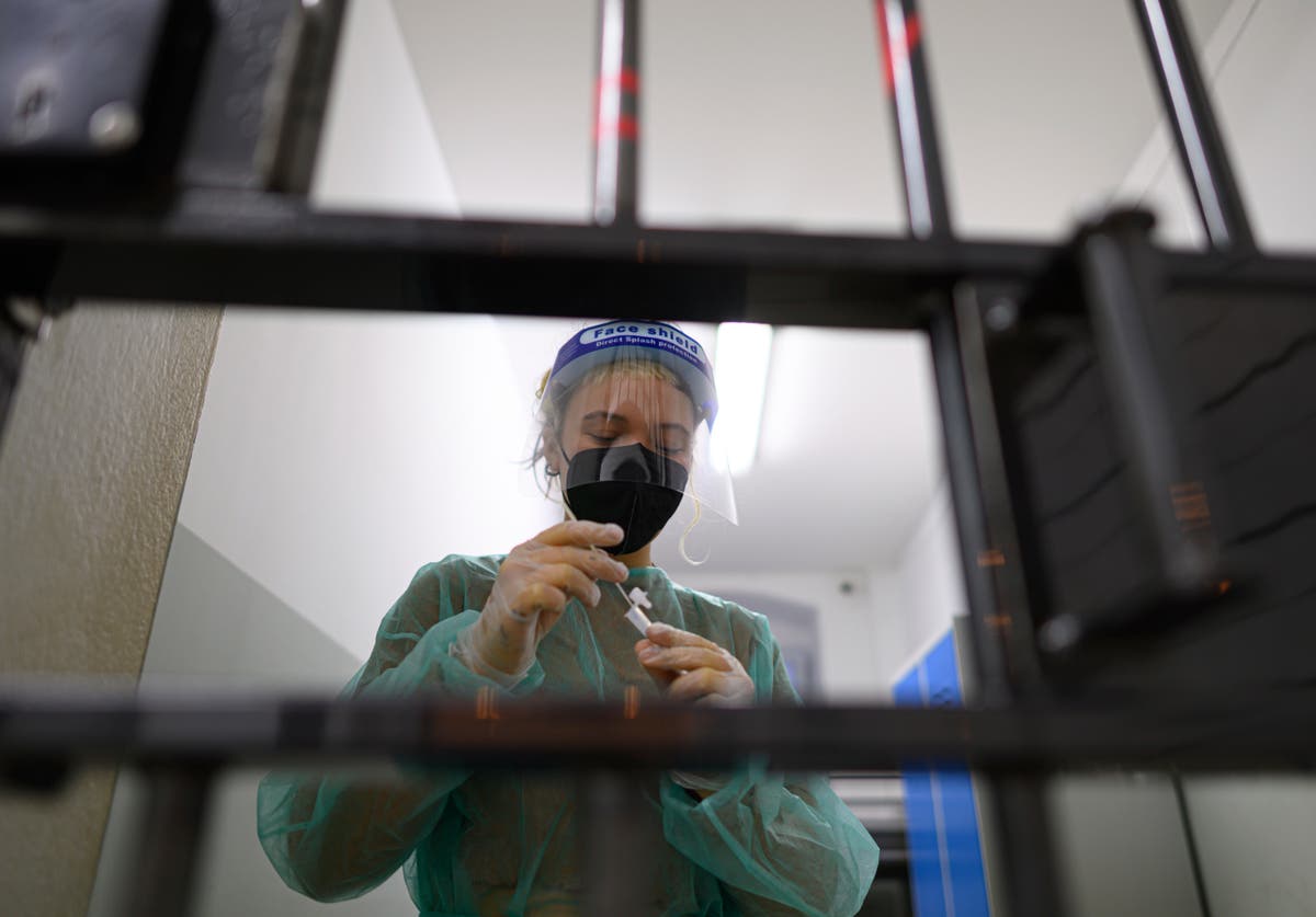 German lawmakers debate 1st, partial vaccine mandate German lawmakers debate 1st, partial vaccine mandate