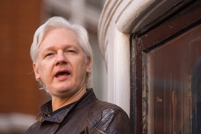 Julian Assange speaking from the balcony of the Ecuadorian embassy in London (PA)