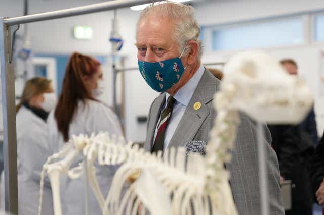The Prince of Wales passes an animal skeleton during a visit to open Aberystwyth University’s new School of Veterinary Science at Aberystwyth University, Penglais, Aberystwyth (Jacob King/PA)