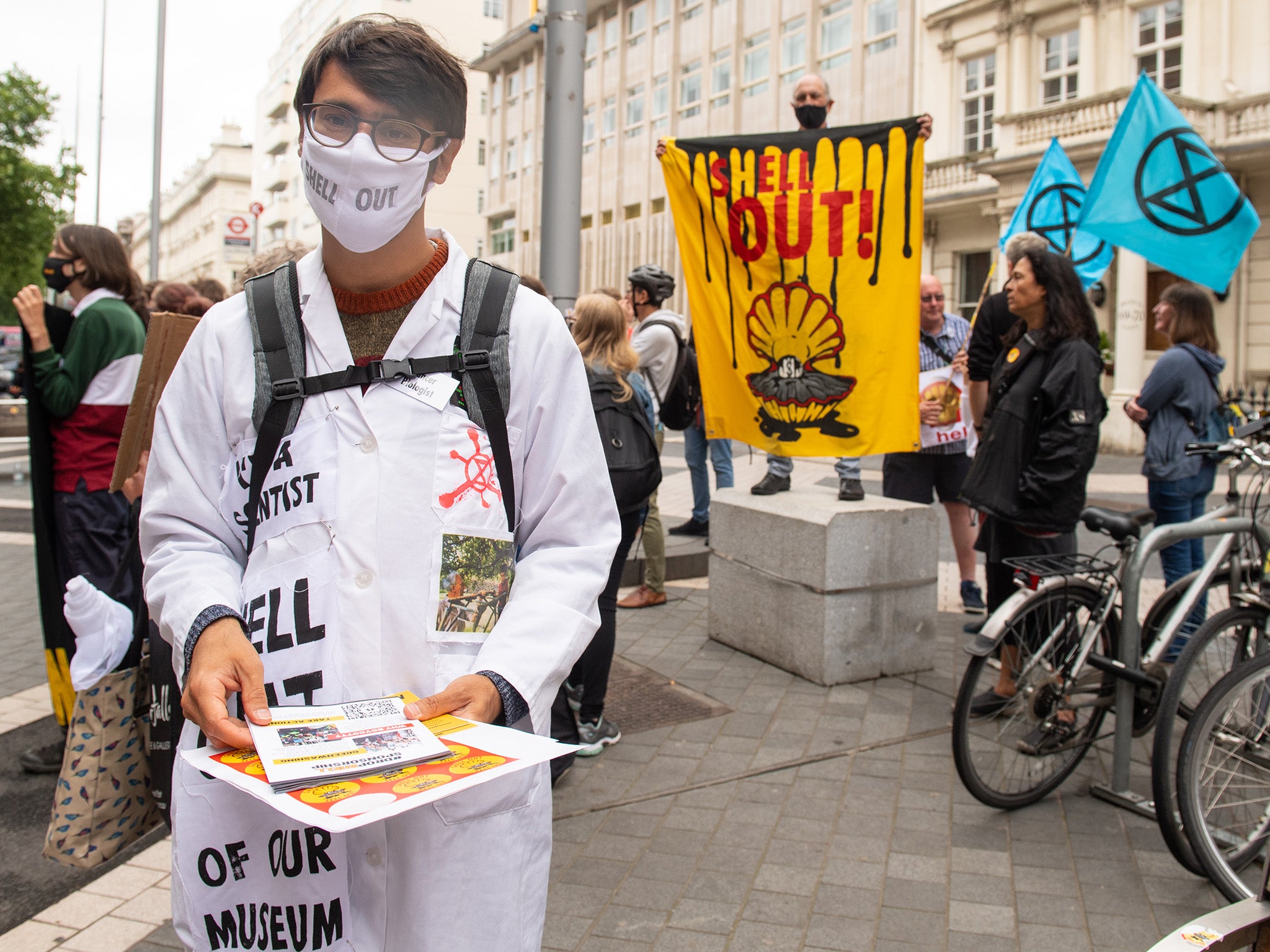 Climate activists take part in an anti-Shell protest at the Science Museum in London