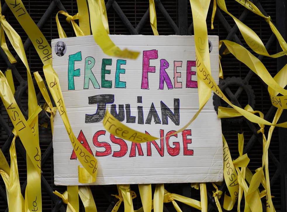 Julian Assange supporters gathered outside the High Court in London on Friday as the ruling was handed down (Kirsty O’Connor/PA)