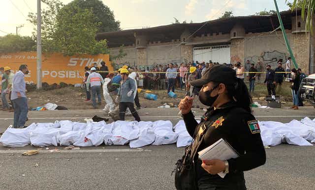 <p>The devastating scene following the truck crash that has left at least 54 people dead</p>