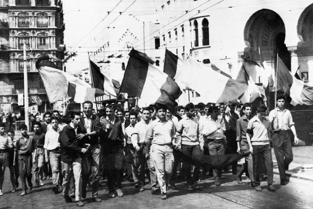 <p>On May 13, 1958 young people waving French flags roam the streets of Algiers on their way to the Forum square and the government palace stormed by demonstrators, during the Algerian war.</p>