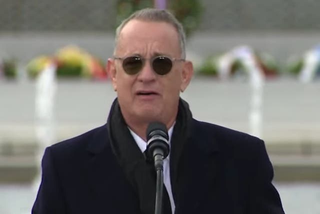 <p>Tom Hanks pays tribute to the late Senator Bob Dole at the World War II Memorial in Washington, DC on 10 December 2021</p>
