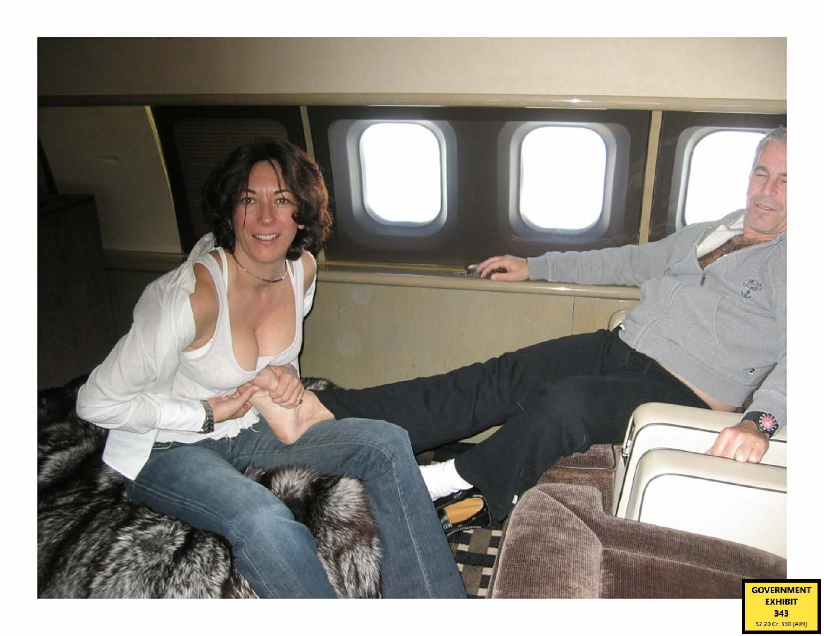 Maxwell massages Epstein’s feet with her breasts aboard a private jet
