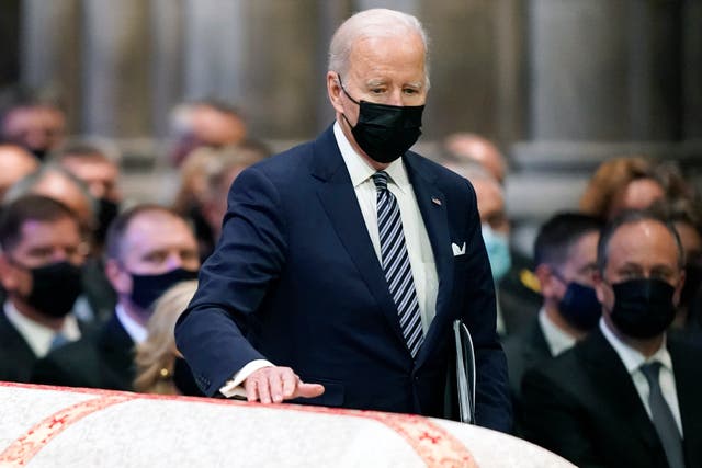 <p>Joe Biden approaches the casket of Bob Dole, the Republican legislator who died at age 98 last week.  </p>
