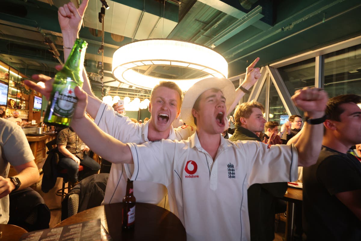 Barmy Army cheer on England cricketers as they lose first Ashes Test