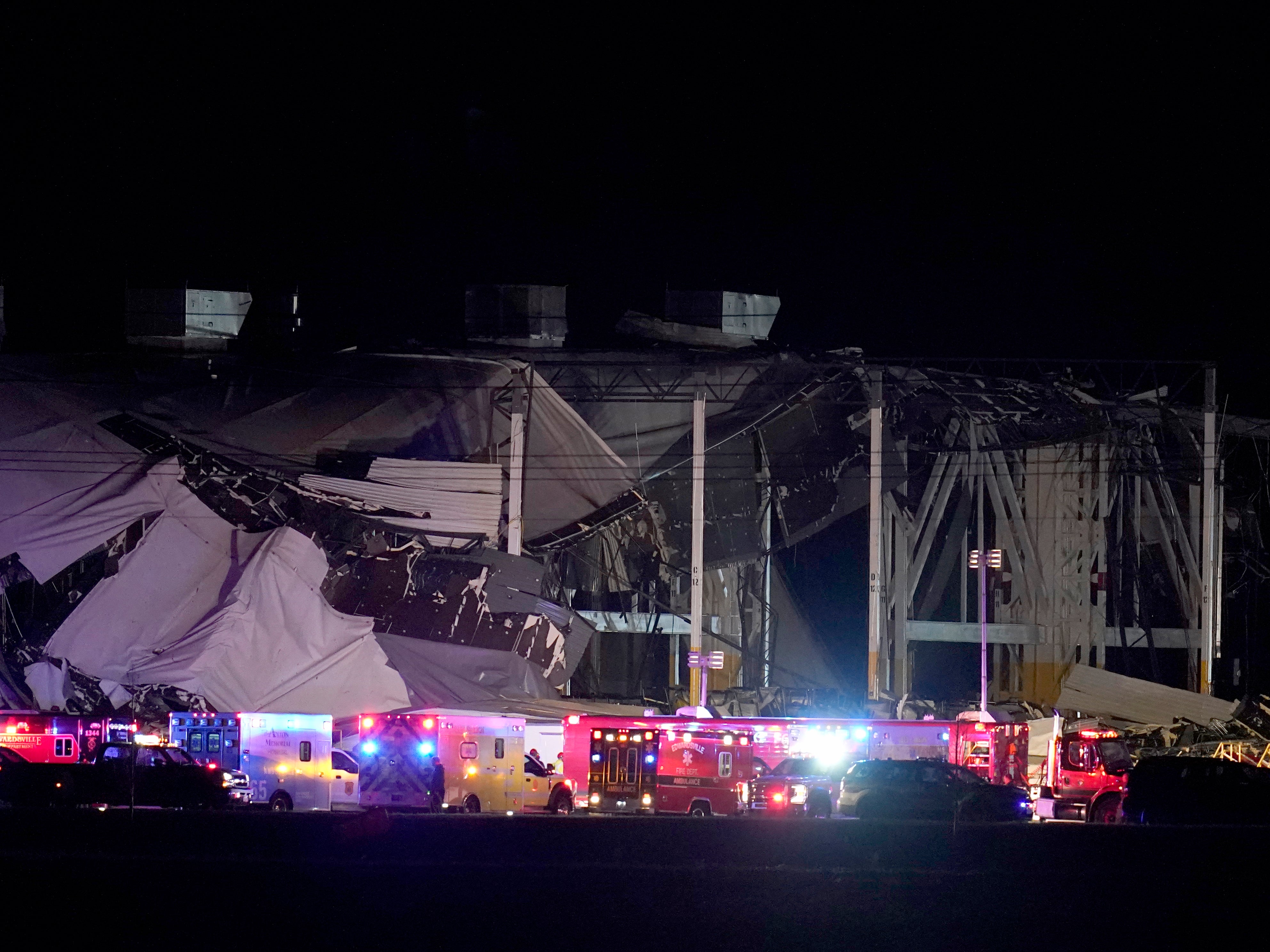 An Amazon distribution center is heavily damaged after a strong thunderstorm moved through the area Friday, Dec. 10, 2021, in Edwardsville