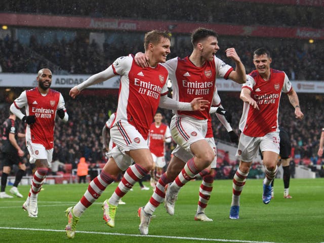 <p>Martin Odegaard (second left) celebrates Arsenal’s second goal against Southampton </p>