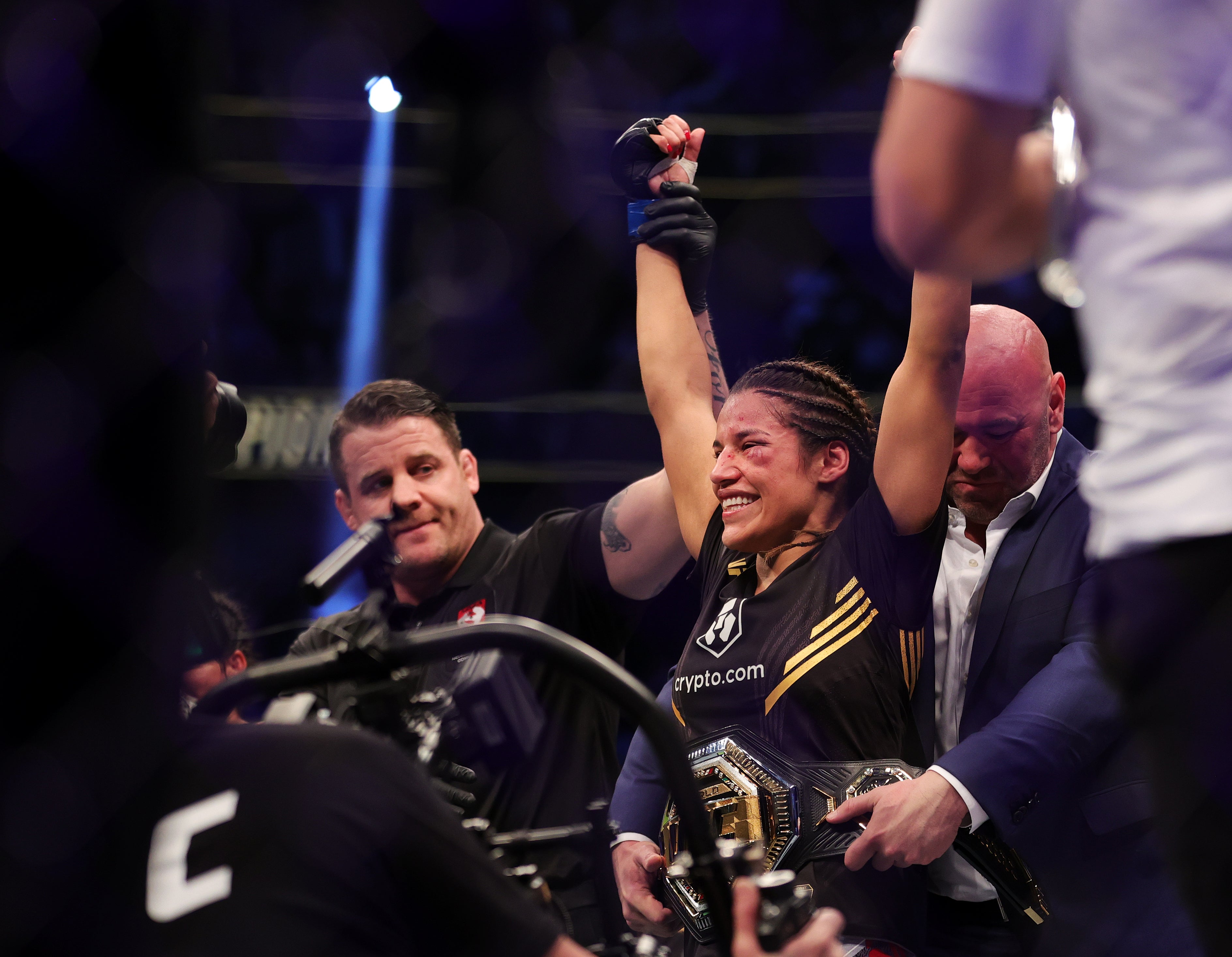 Julianna Pena celebrates her submission win over Amanda Nunes