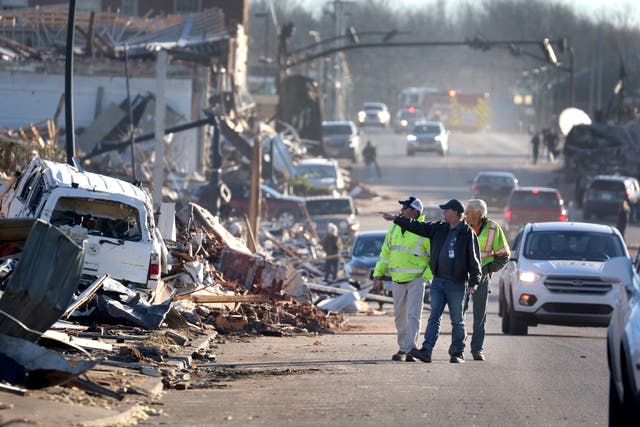 <p>Homes and business are reduced to rubble after a tornado ripped through the area two days prior on 12 December 2021 in Mayfield, Kentucky</p>