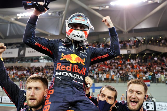 Max Verstappen claimed his first Formula One world title in extraordinary fashion in Abu Dhabi (PA)
