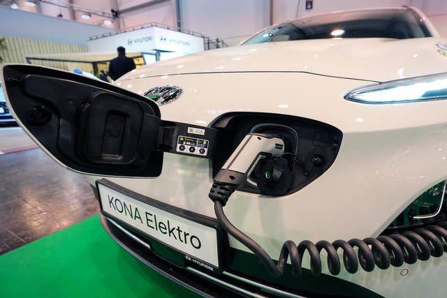 <p>A Hyundai Kona electric car is charged at the Motor Show in Essen, Germany</p>