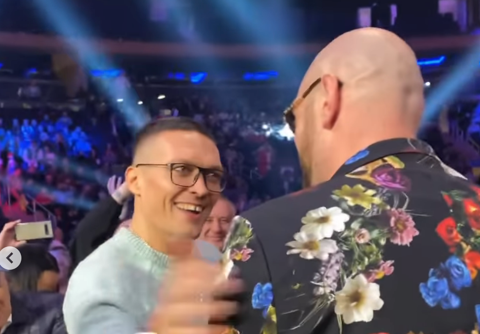 Oleksandr Usyk (left) greets Tyson Fury in Madison Square Garden