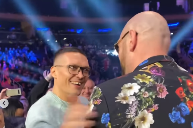 <p>Oleksandr Usyk (left) greets Tyson Fury in Madison Square Garden</p>