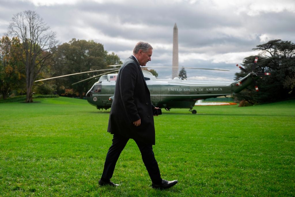 Former White House chief of staff Mark Meadows walks past Marine One on the White House lawn