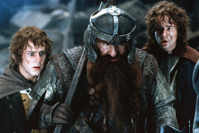 <p>Dominic Monaghan, John Rhys-Davies and Billy Boyd in ‘The Fellowship of the Ring'</p>