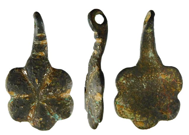 A copper-alloy medieval harness pendant discovered in Lincolnshire, which has become the one millionth archaeological discovery found by members of the public (British Museum/PA)