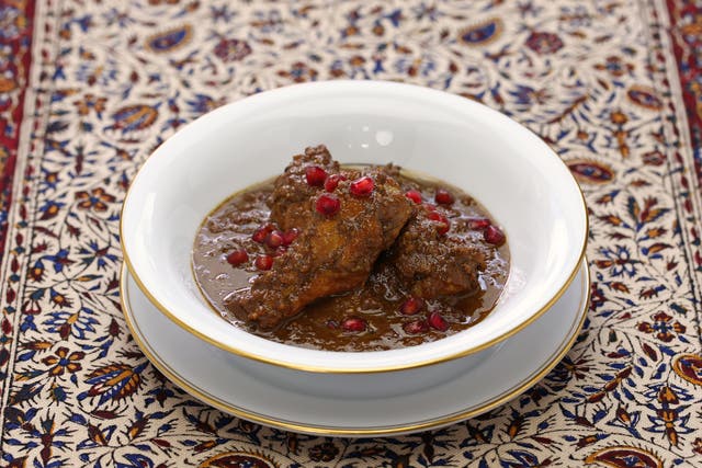 <p>Khoresh morgh naardooni (pomegranate chicken stew), also called anar mosama, is a celebratory dish to serve on Yalda</p>