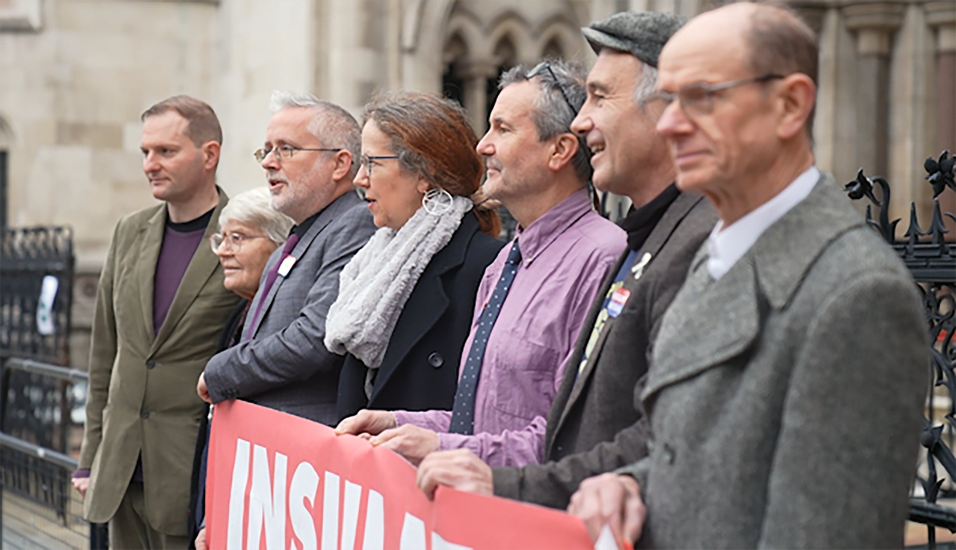 Members of Insulate Britain outside the High Court in London (Elspeth Keep/PA)