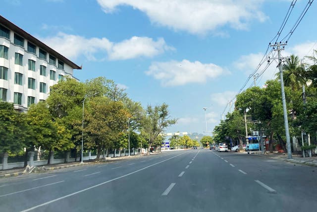 <p>An empty street on Friday in Mandalay, central Myanmar amid a ‘silent strike’ as Soe Naing, a local freelance photographer, died in military custody after being arrested last week while covering the strike </p>