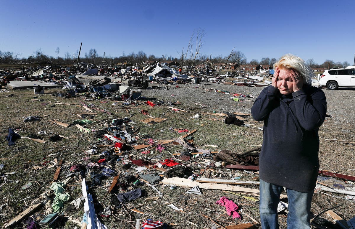 Kentucky tornado - latest: Biden takes aerial tour of wreckage as survivors plead for more temporary housing