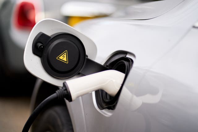 Grants for new electric cars have been slashed by 40% to ‘enable taxpayers’ money to go further’, the Department for Transport (DfT) has announced (John Walton/PA)