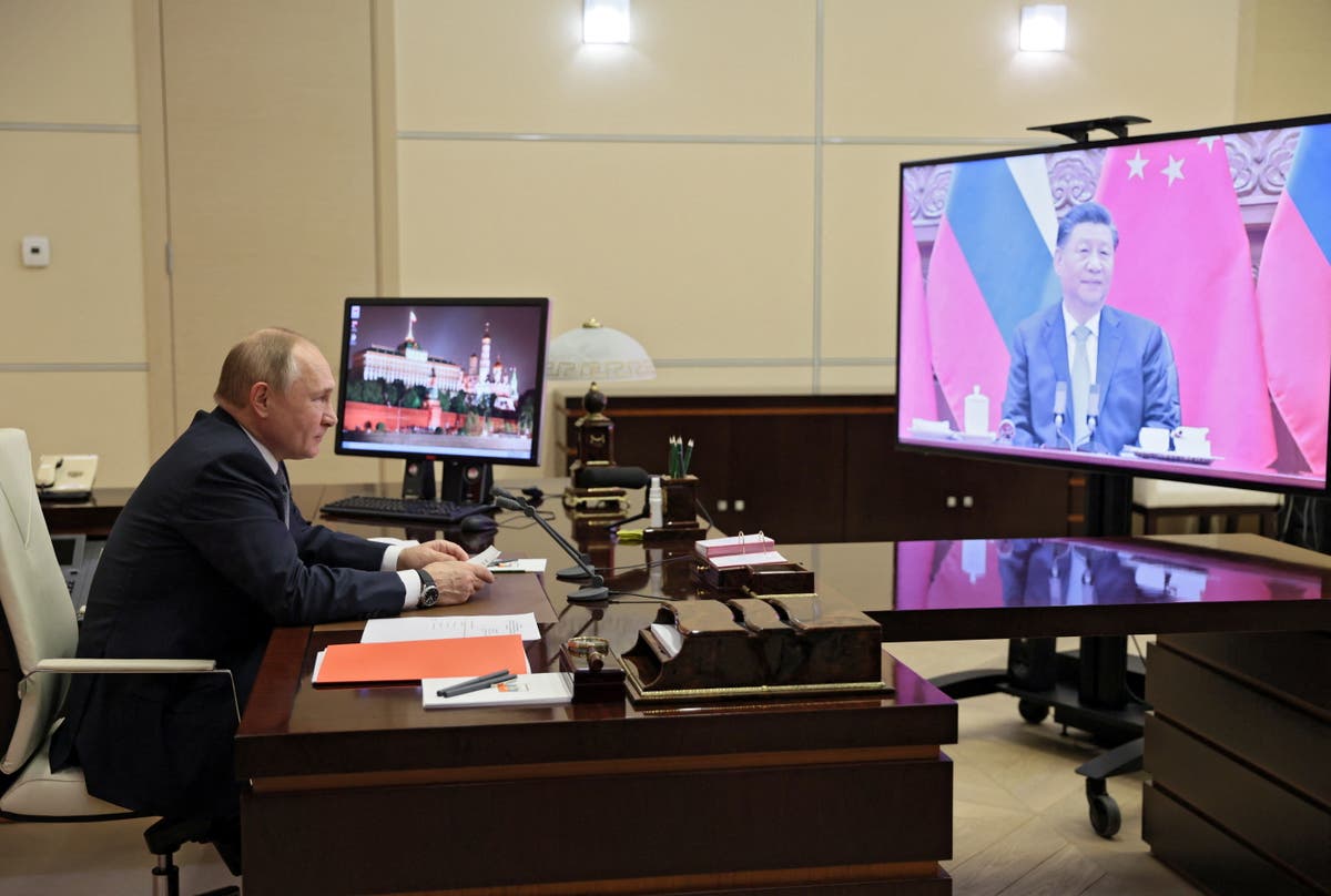 Putin and Xi exchange warm words and promise never to &lsquo;interfere in each other&rsquo;s internal affairs&rsquo;