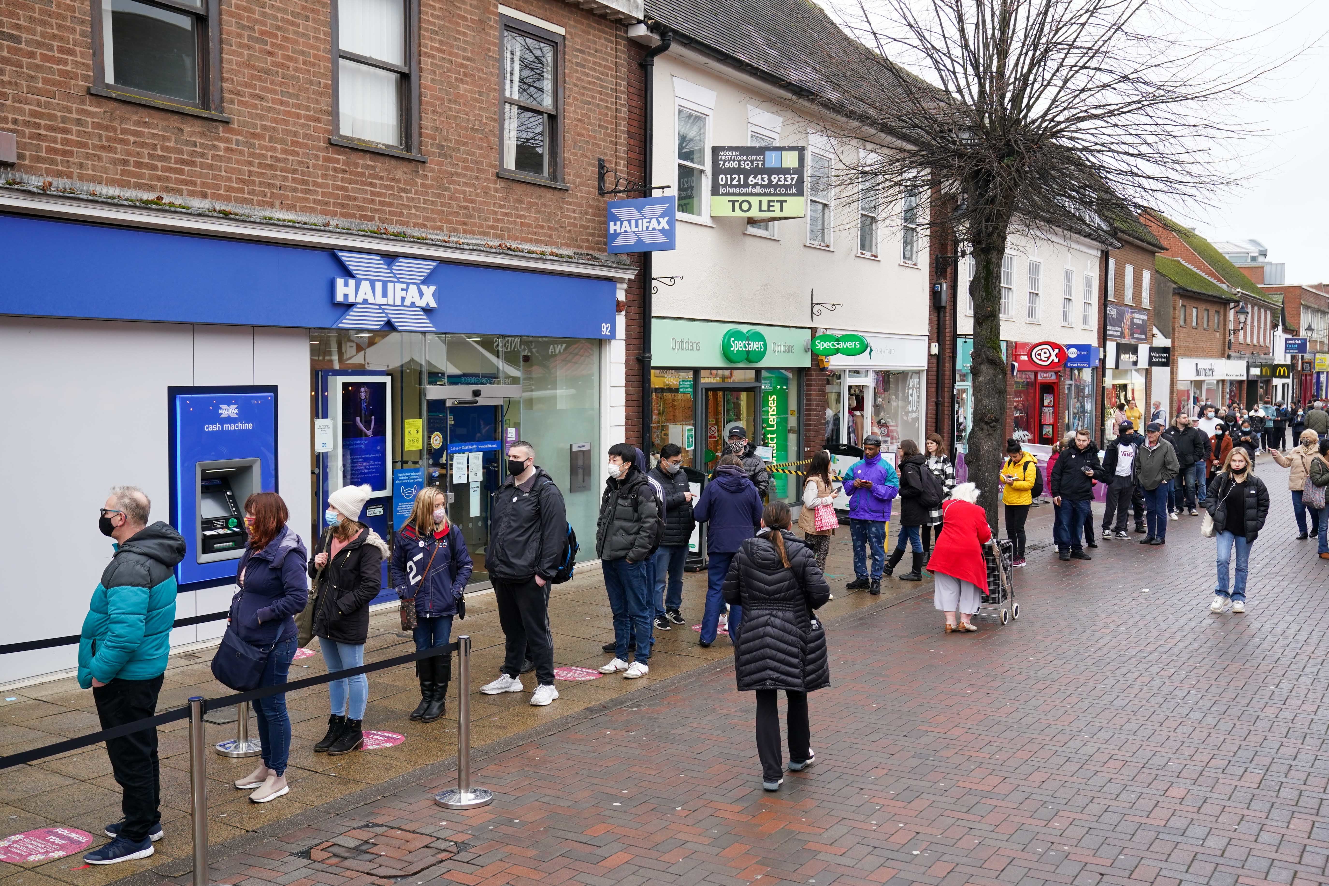 Hundreds queue at a vaccination centre on Solihull High Street, West Midlands