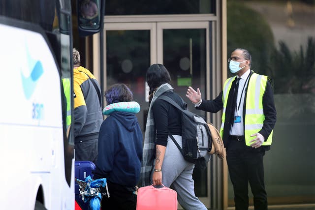 Travellers detained in quarantine hotels will be told later today when they will be released, a senior official said (Yui Mok/PA)