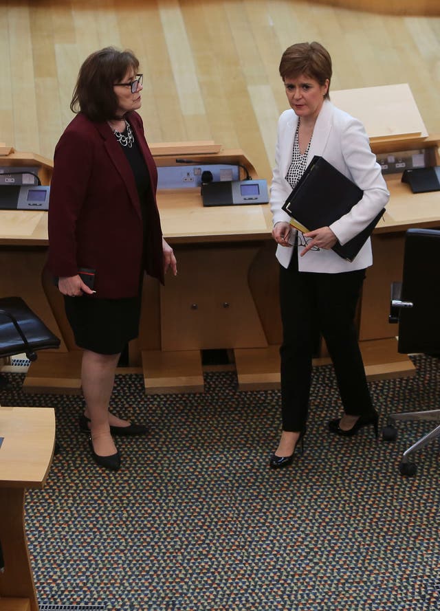 First Minister Nicola Sturgeon, right, and former health secretary Jeane Freeman have both said sending people into care homes untested was a mistake (PA)