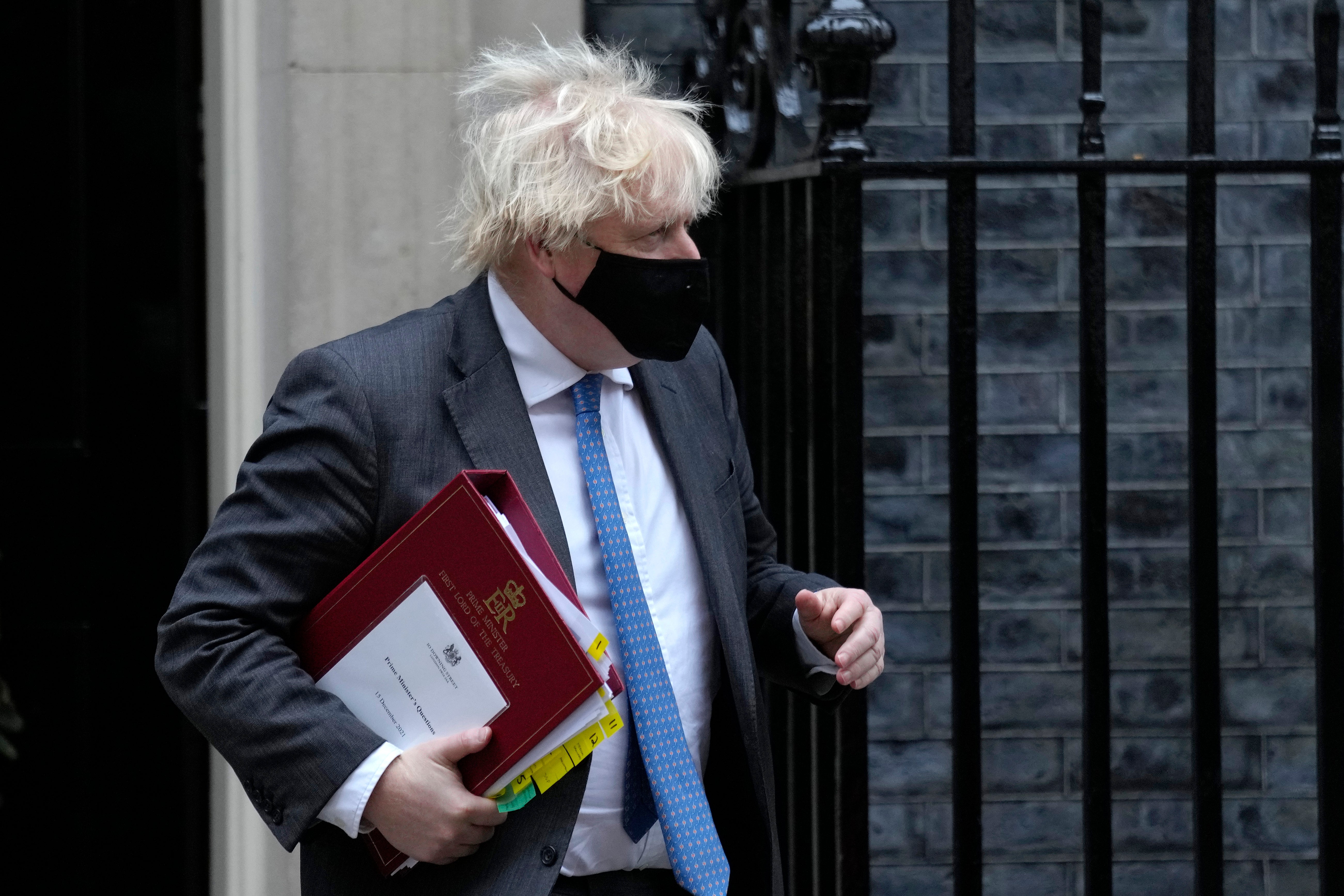 Boris Johnson leaves 10 Downing Street in a face mask