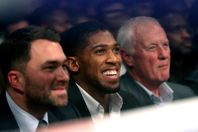 <p>Anthony Joshua (centre) is a former two-time world heavyweight champion (Adam Davy/PA)</p>