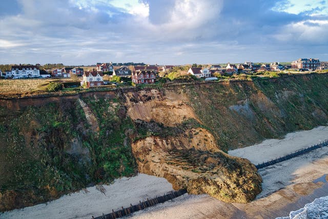 <p>This is the shocking scene as two stunning cliff-top homes were left perching 40 mts above the sea after a huge landslide struck overnight</p>