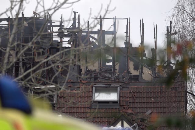 Damage to a property in Grovelands Road, Reading, where one person has died and others are “unaccounted for” in a large fire (PA)