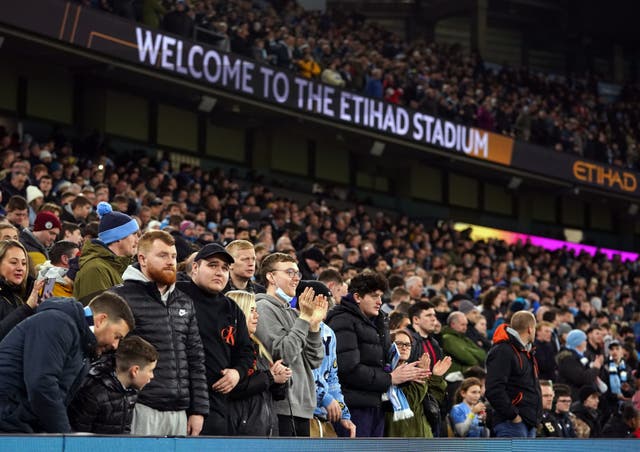 <p>Manchester City fans at the Etihad Stadium earlier this week</p>