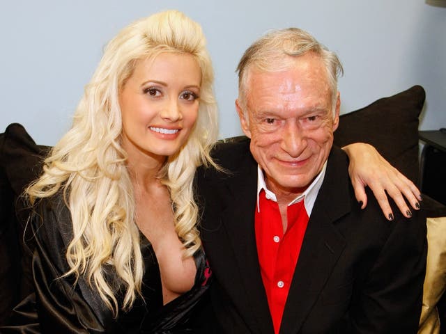 <p>Television personality and model Holly Madison (L) and Playboy founder Hugh Hefner appear in Madison's dressing room after Hefner attended the adult production, "PEEPSHOW" starring Madison at the Planet Hollywood Resort & Casino July 18, 2009</p>
