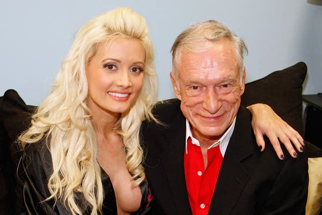<p>Television personality and model Holly Madison (L) and Playboy founder Hugh Hefner appear in Madison's dressing room after Hefner attended the adult production, "PEEPSHOW" starring Madison at the Planet Hollywood Resort & Casino July 18, 2009</p>