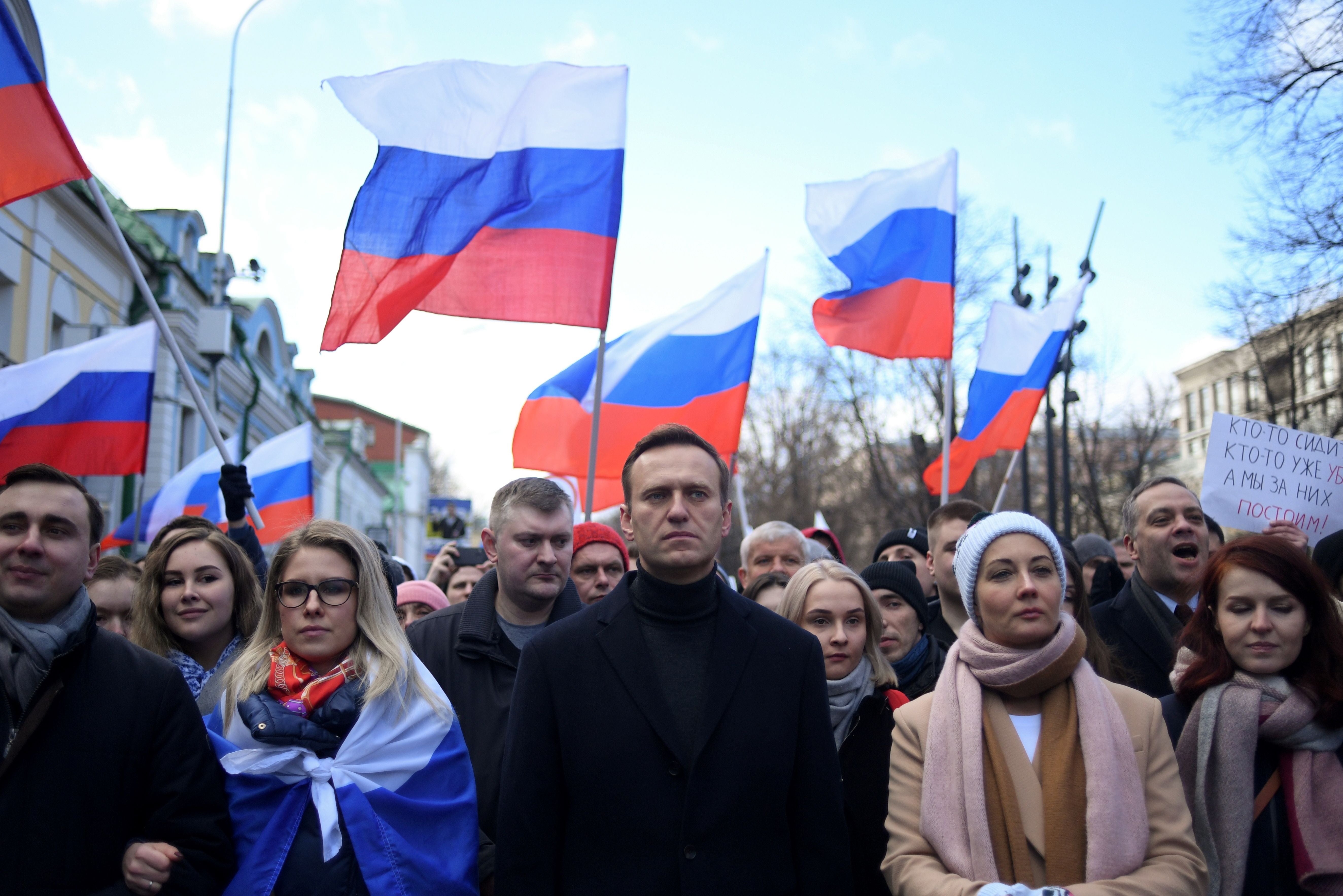 Russian opposition leader Alexei Navalny and other demonstrators march in memory of murdered Kremlin critic Boris Nemtsov in Moscow