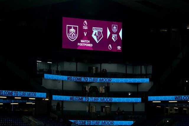 A general view of the giant screen confirming that the Premier League match at Turf Moor between Burnley and Watford has been postponed (Martin Rickett/PA)