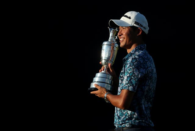<p>Collin Morikawa poses with the Claret Jug after winning The Open</p>