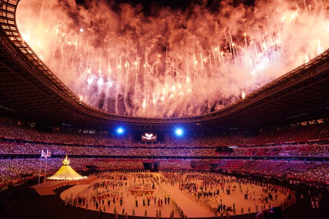 Fireworks go off during the opening ceremony of the Tokyo Olympics (Martin Rickett/PA).