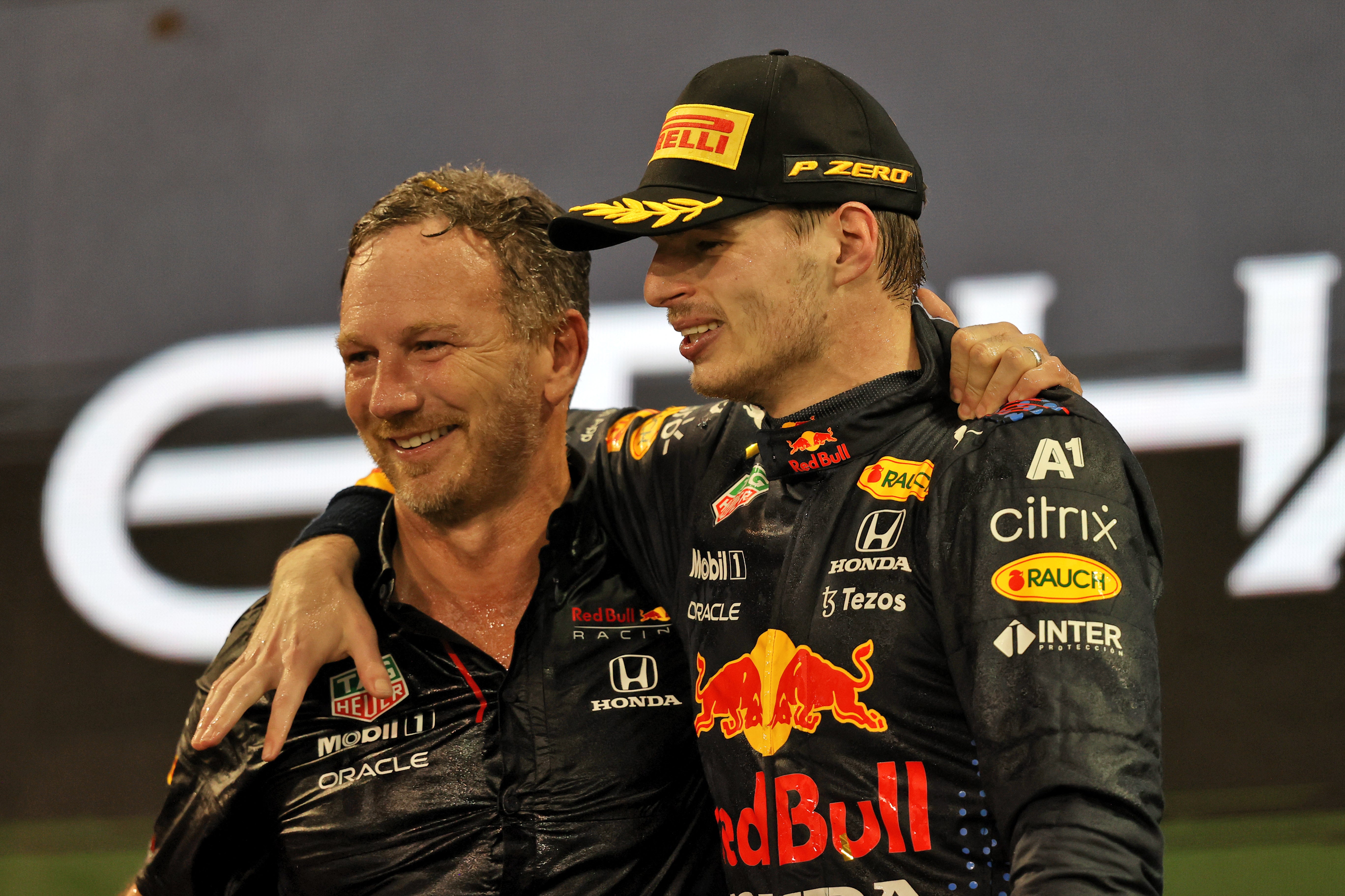 Verstappen and boss Christian Horner had to wait for the stewards to rule on an appeal by Mercedes before they could celebrate (PA)