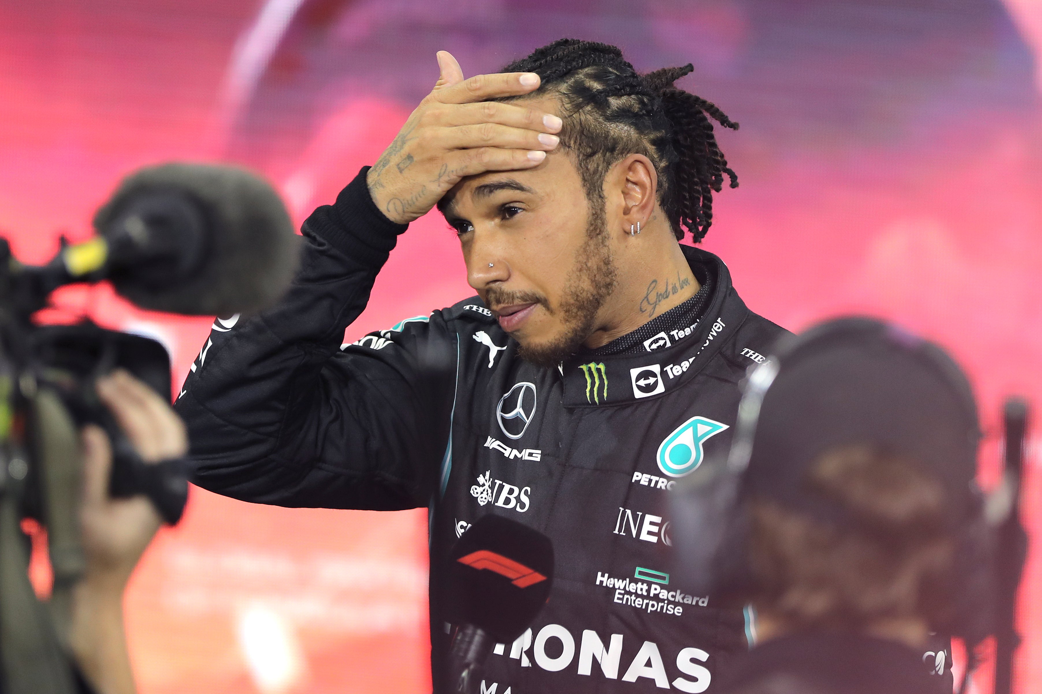 Lewis Hamilton was left to reflect on what might have been after losing the world title on the final lap of the season (Kamran Jebreili/AP)